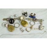 A group of jewellery to include Pharaoh pendant, rings, locket, filagree necklace etc.