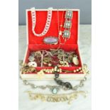 A quantity of costume jewellery including mother of pearl necklace, rosary, bracelets etc.