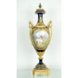 A French Ormolu-Mounted Sèvres Style Porcelain Vase, cobalt blue ground and hand painted oval