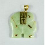 A yellow metal and jade elephant pendant, 6g total.