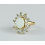 A 9ct gold dress ring set with paste stones and oval opal, flower head setting, size L/M, 4.3g.