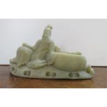 A 19th century Chinese soapstone reclining figure.