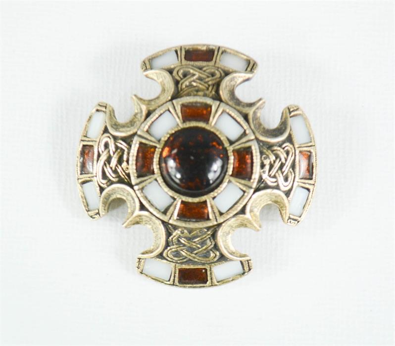 A Scottish 1960s Miracle Chalcedony and amber brooch.