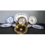 A box of blue and white ceramics including meat plates, mantle clock etc.