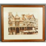 A sepia watercolour, monogrammed, with Jacobean shop fronts,.
