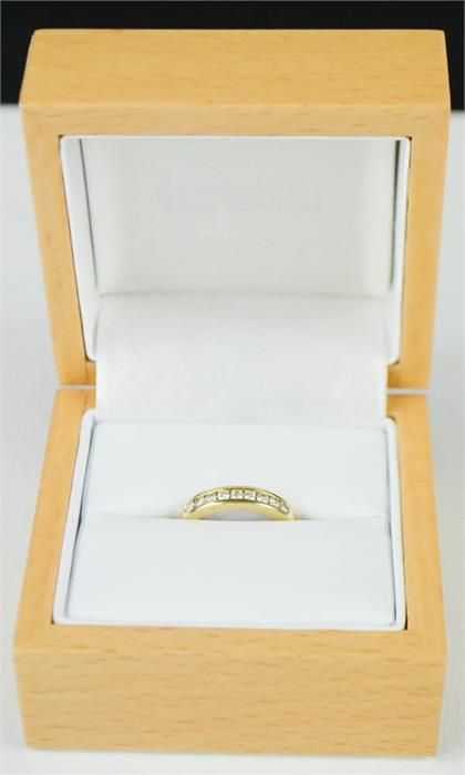 An 18ct gold ring, set with a band of diamonds, 2.8g.. - Image 2 of 2