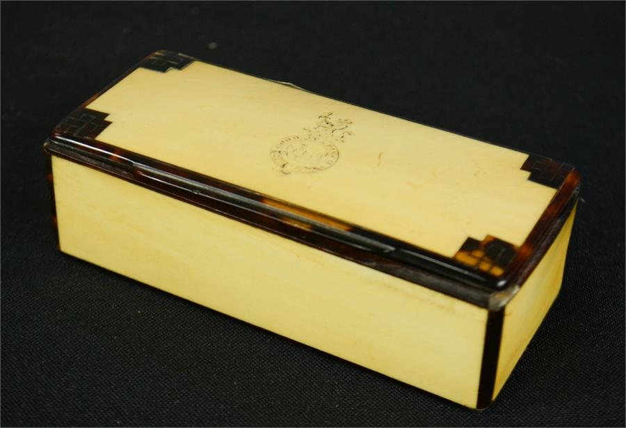 A 19th century tortoiseshell snuff box, with gold inlaid stringing, and crest engraved to the - Image 2 of 4