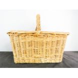 A bakers wicker bread basket 48cm by 35 by 26cm
