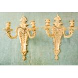 A pair of gilt ormolu wall lights in the manner of Jean-Joseph St Germain.