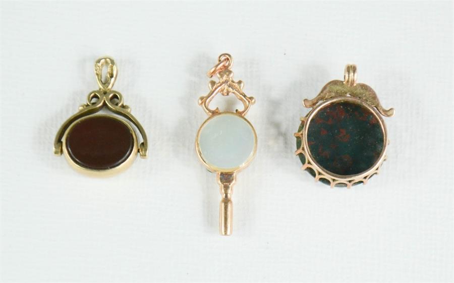 Three yellow metal and agate pendants, 8.9g. - Image 2 of 2