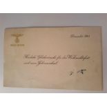 An original Christmas card from Adolf Hitler, dated December 1943, signed in ink by Hitler lower