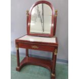 In the Manner of Jacob Frere; a mirrored dressing table with marble top, and gilt ormolu mounts.