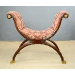 A rare 19th century mahogany window seat circa 1810, with carved and gilded patere, and