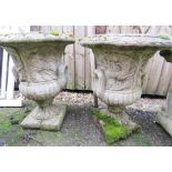Two traditional style garden urns.