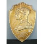 An embossed commemorative plaque, King George VI and Queen Elizabeth 45cm high.