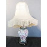 A Chinese ceramic table lamp with cream shade, 46cm overall height.