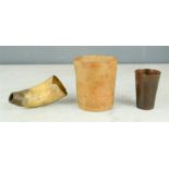 A group of antique horn beakers.