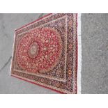 A Persian Kashan design red ground rug / wall hanging 230 by 160cm.