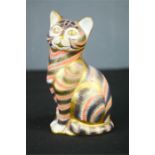 A Royal Crown Derby bone china cat, LI 13cm high.