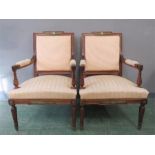 A pair of mahogany library chairs.