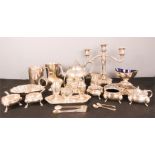 A group of silver plate to include a tea pot, two tankards, condiment dishes, shell form dish and