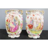 A pair of gilt border vases decorated with classical figures.