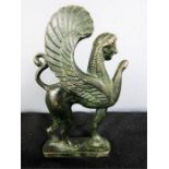 A bronze winged griffin 12cm by 7cm..