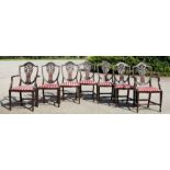 A set of six 19th century mahogany dining chairs and two carvers, with Prince of Wales feather