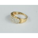 A 9ct gold and diamond cluster ring, size N, 2.7g.