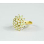 A 9ct gold opal cluster flowerhead ring, size L, 3.3g.