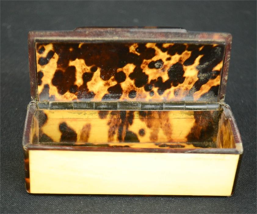 A 19th century tortoiseshell snuff box, with gold inlaid stringing, and crest engraved to the - Image 3 of 4