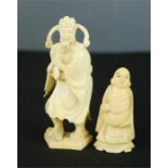 Two carved bone Chinese figures.