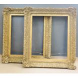 A pair of large 19th century gilt composition frames each 92cm wide by 105cm high.