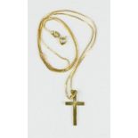 A 9ct gold cross and chain, 2.7g