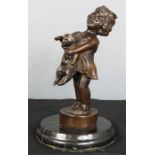 A late 19th century bronze of a young girl and a cat on a marble base, 21cm high.