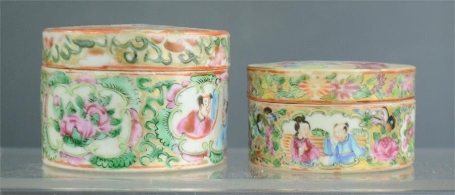 Two Chinese cylindrical boxes, 19th century, enamelled with figural scenes.