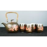 A Japanese tea set, with prunus blossom decoration.