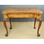 A fine George I walnut Irish herringbone crossbanded gaming table, with cabriole legs.