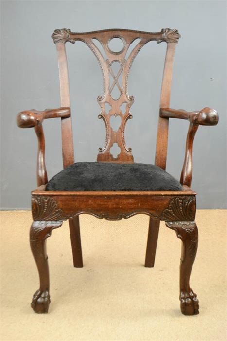 A rare Chippendale period arm chair, with unitual ball and claw terminal arms, circa 1760,