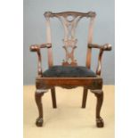 A rare Chippendale period arm chair, with unitual ball and claw terminal arms, circa 1760,