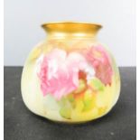 A Royal Worcester vase, in the rose pattern.