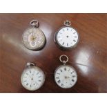 Four silver pocket watches.