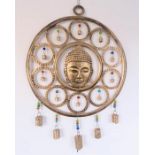 A Buddah wall chime, 52 by 37cm.