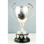 A silver trophy to Isle of Ely Education Committee, London 1927, 17.23toz, the ebonised base bearing