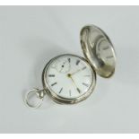A silver pocket watch, London, machine engraved case.