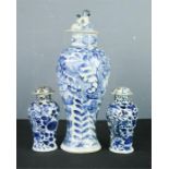A pair of Chinese blue and white jars and covers 14cm, a blue and white vase depicting dragon and