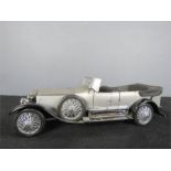 A 1925 Silver Rolls Royce model Silver Ghost.