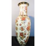 A Japanese vase, decorated with red flowers.