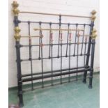A brass and iron bedstead, head and footboards and side irons, 140cm wide.