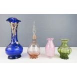 A group of glass including green glass vase, peach coloured scent bottle blue glass vase, 25cm
